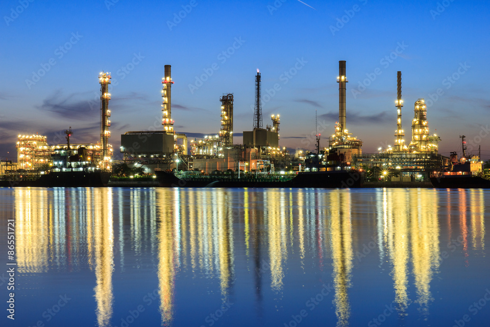 Oil refinery along the river at Dusk (Bangkok, Thailand)