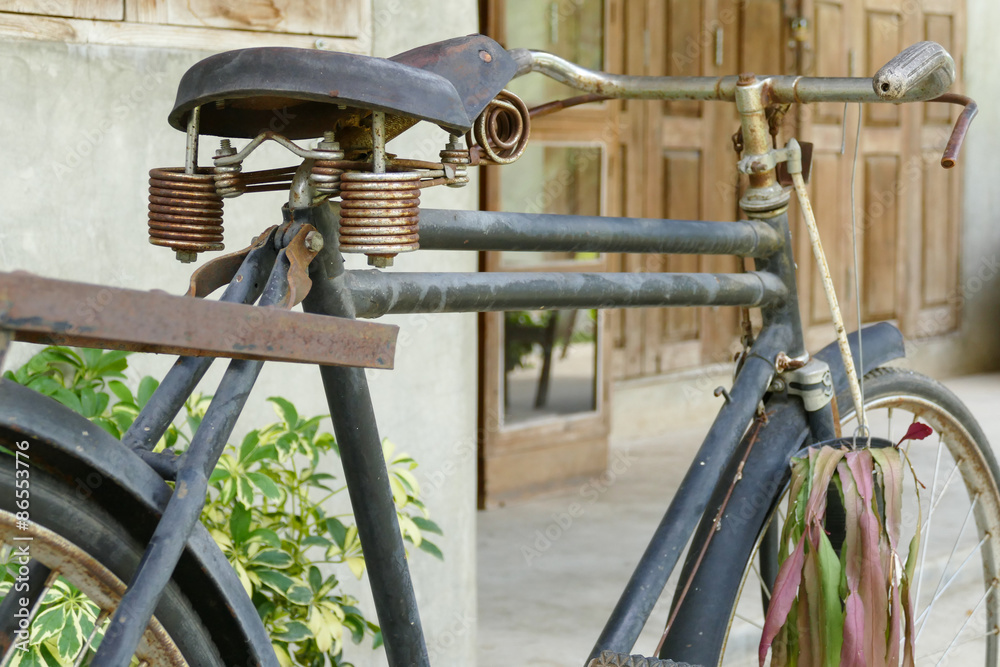 old rusty black bicycle