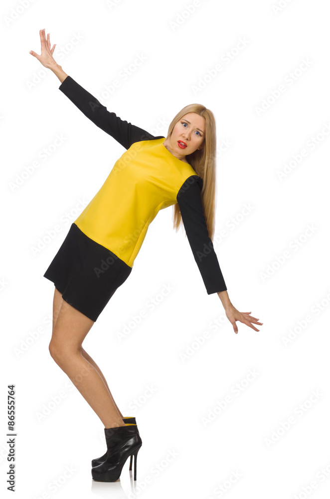 Blond hair girl in yellow and black clothing isolated on white Blond hair girl in yellow and black clothing isolated on white