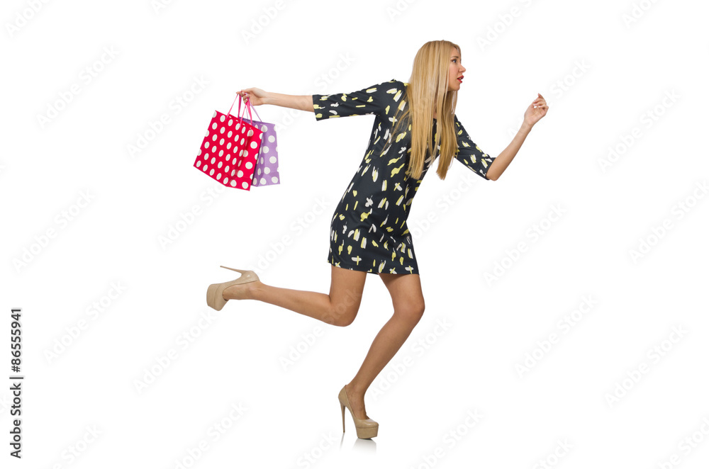 Young woman with plastic bags isolated on white Young woman with plastic bags isolated on white