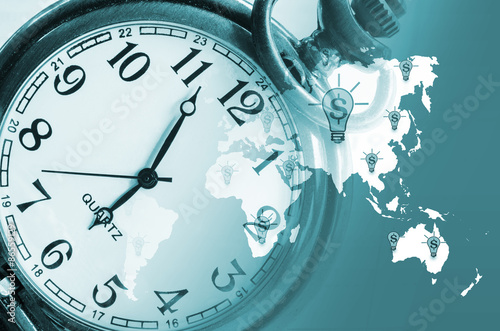 vintage clock on business world background.