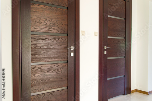 Two pair of brown wooden doors