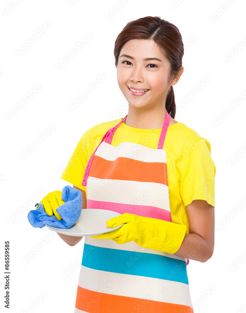 Housewife wash the dishes with plastic gloves Housewife wash the dishes with plastic gloves