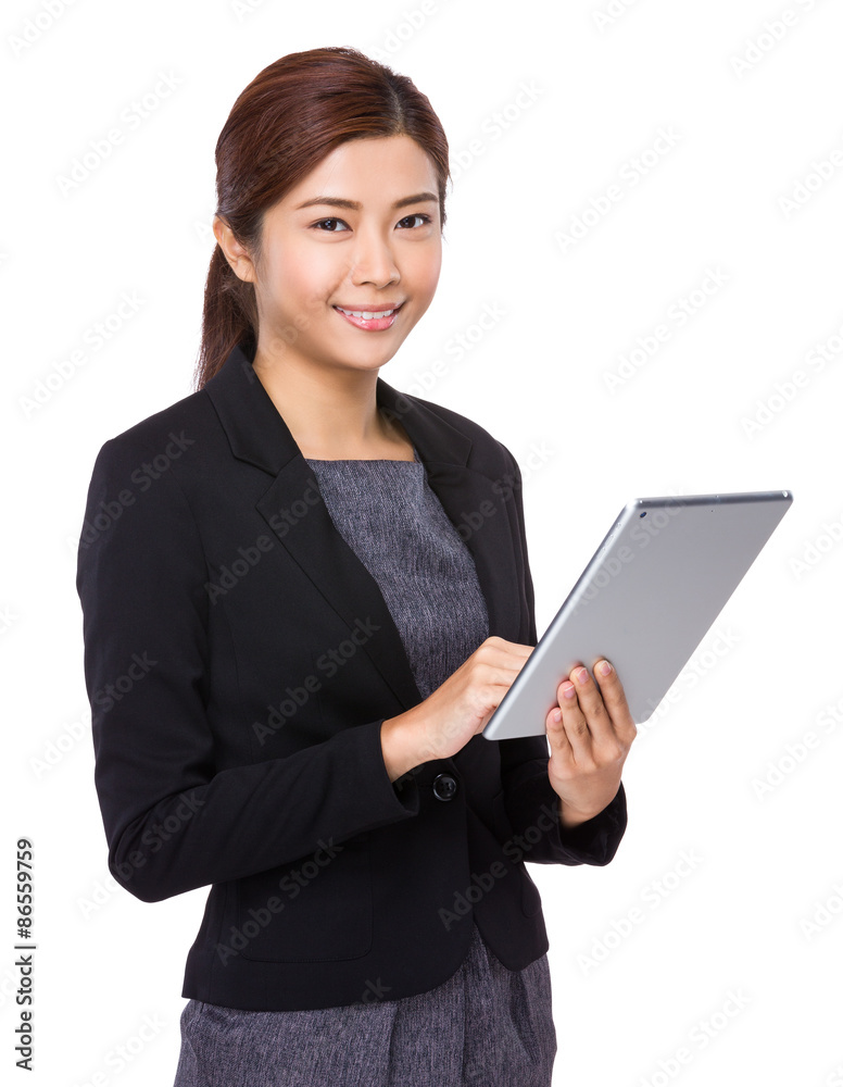 Young businesswoman use of the digital tablet Young businesswoman use of the digital tablet