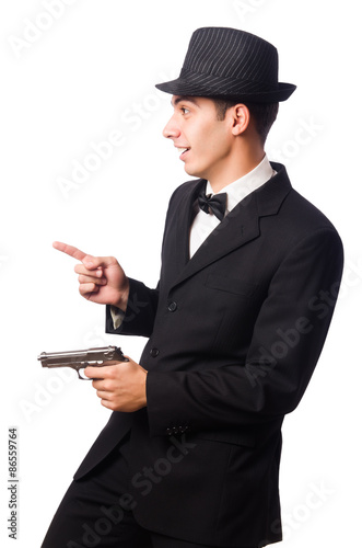 Young elegant man holding handgun isolated on white
