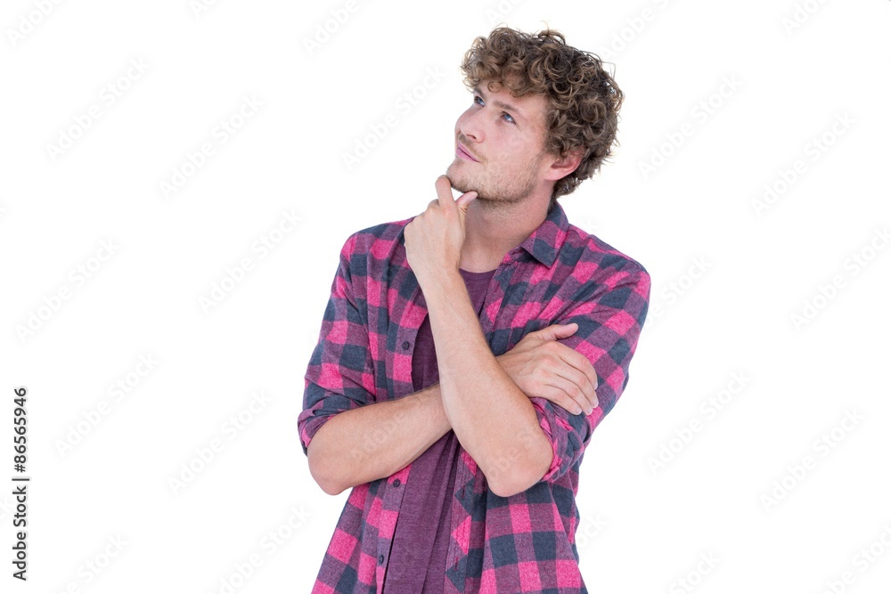 Happy handsome looking away with hand on chin Happy handsome looking away with hand on chin