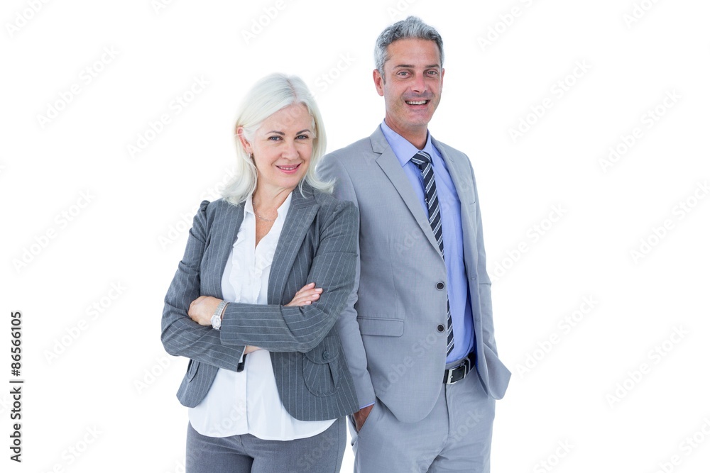 Smiling businesswoman and man with arms crossed Smiling businesswoman and man with arms crossed