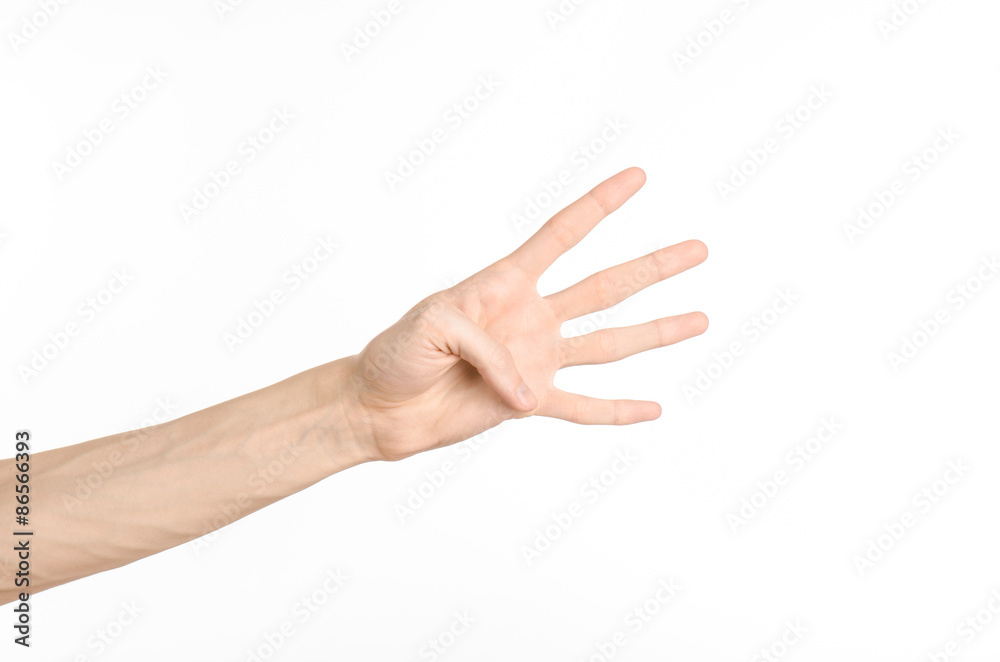Hand gestures theme: the human hand shows gestures isolated on white background in studio Hand gestures theme: the human hand shows gestures isolated on white background in studio