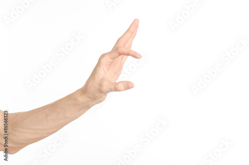 Hand gestures theme: the human hand shows gestures isolated on white background in studio