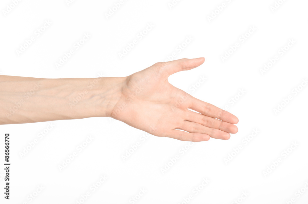 Hand gestures theme: the human hand shows gestures isolated on white background in studio Hand gestures theme: the human hand shows gestures isolated on white background in studio