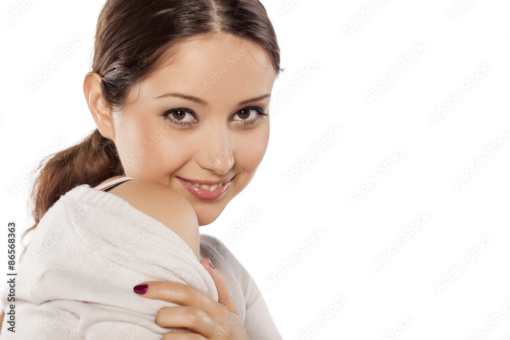 seductive and smiling young woman on a white background seductive and smiling young woman on a white background