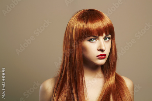 Beauty Girl Portrait.Healthy Red Hair.Beautiful Young Woman