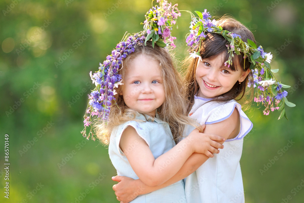 portrait of two girls of girlfriends in the summer in the villag portrait of two girls of girlfriends in the summer in the villag