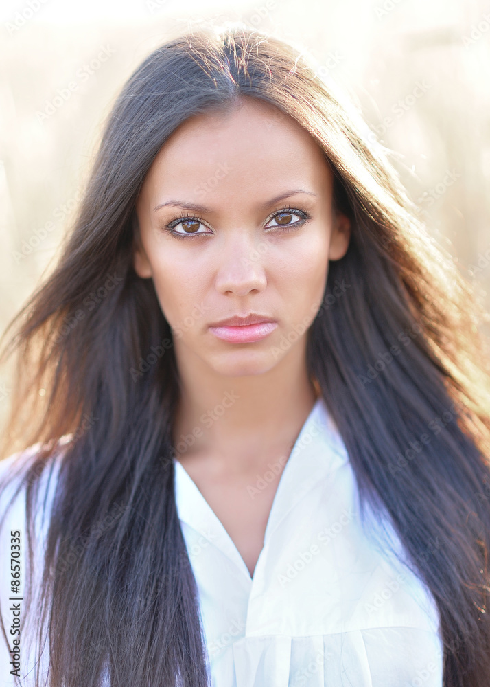 beautiful elegant brunette girl in a field beautiful elegant brunette girl in a field