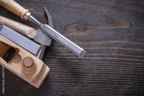 Horizontal version of claw hammer shaving plane and chisels on v