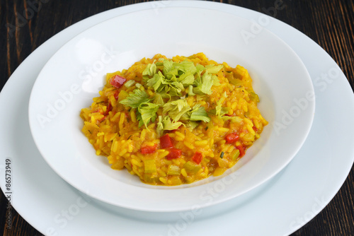 Pumpkin risotto on the wooden table
