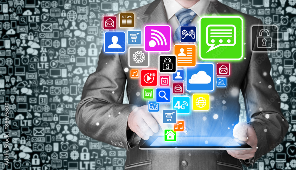 Business man using tablet PC with social media icon set Business man using tablet PC with social media icon set
