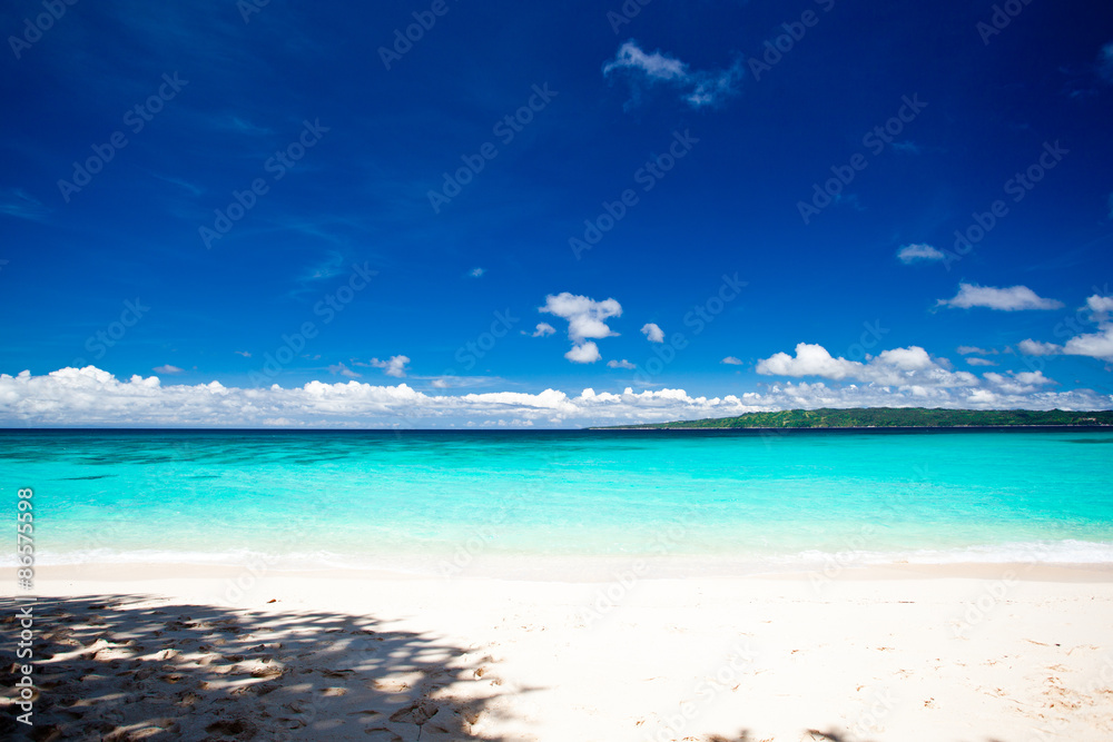 Beach with turquoise water and white sand