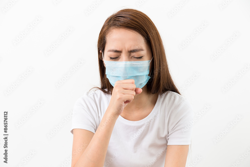 Woman using the protective face mask Woman using the protective face mask