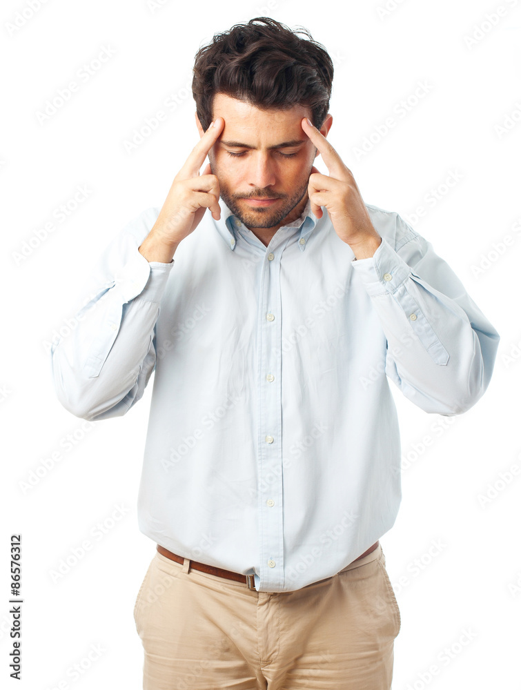 man concentrating with fingers on temple on a white background man concentrating with fingers on temple on a white background
