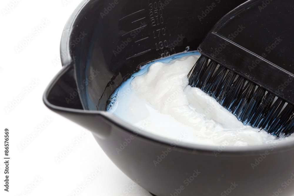Bowl with peroxide and brush Bowl with peroxide and brush