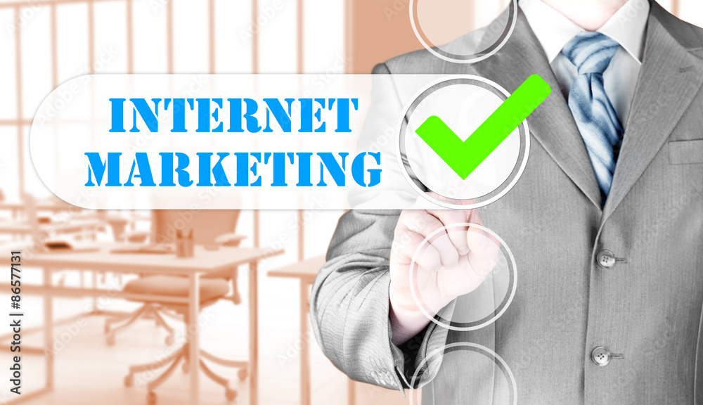 business man pressing checkbox  internet marketing