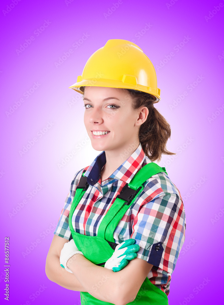 Woman builder against the gradient Woman builder against the gradient