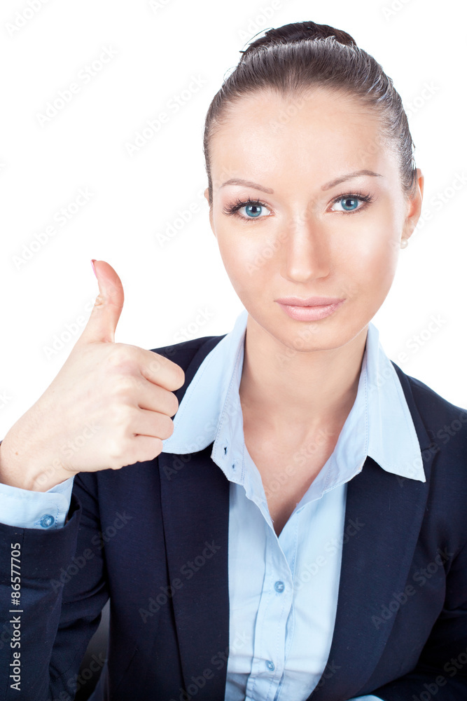 Businesswoman gesturing with a thumbs up Businesswoman gesturing with a thumbs up