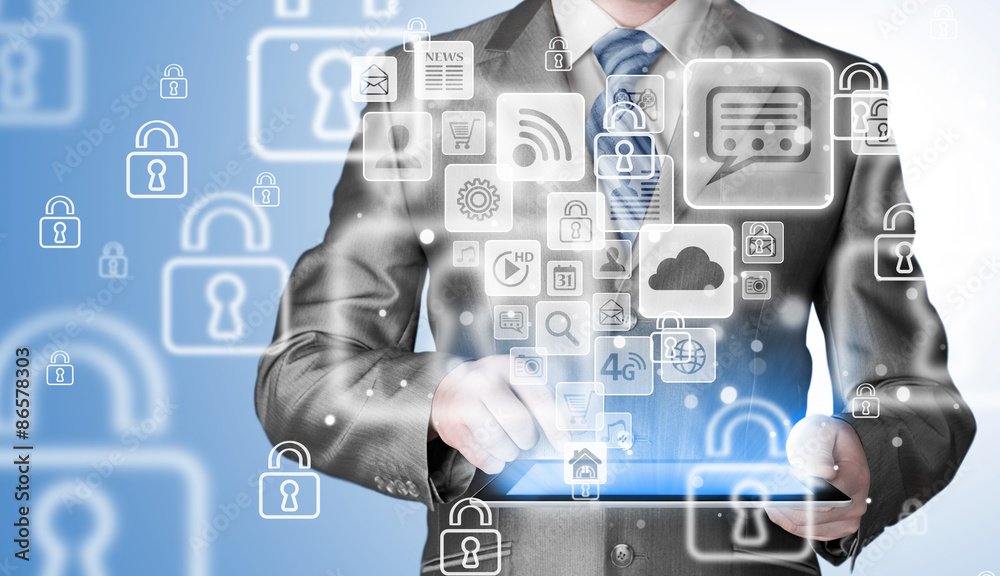 Business man using tablet PC with social media icon set Business man using tablet PC with social media icon set