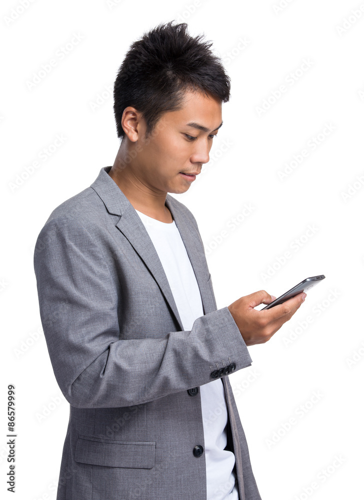 Young businessman use of the mobile phone Young businessman use of the mobile phone