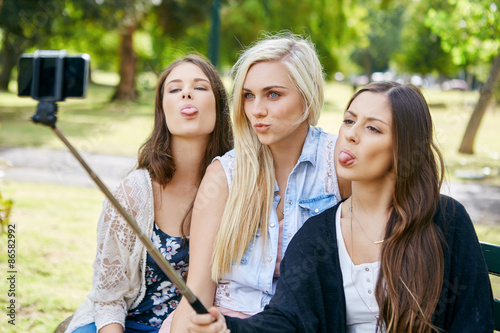 Canvas Print girls selfie stick phone