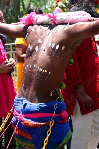 man adorned and pierced for Maha Shivaratri, "Great Night of Shiva" on Mauritius