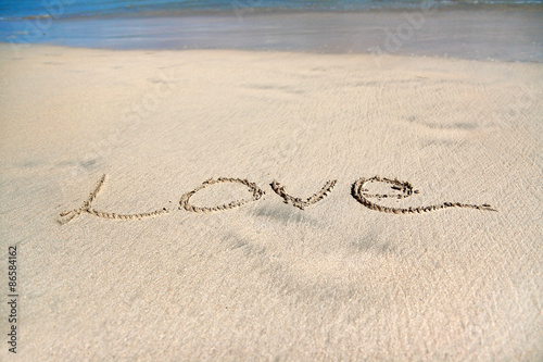 Sign Love on sand