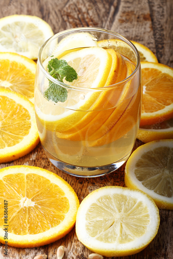 drink and stack of citrus fruits slices. drink and stack of citrus fruits slices.