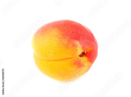 Ripe apricots on white