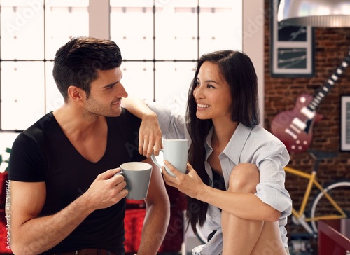 Happy loving couple at home photo