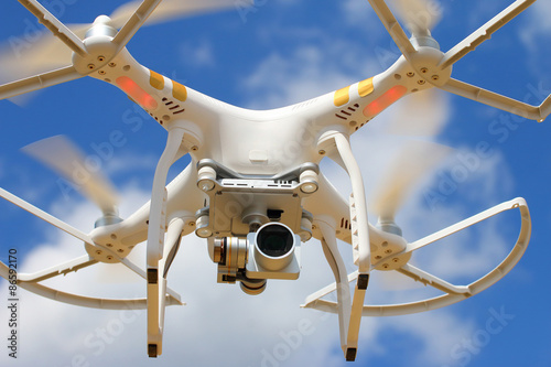 Drone quadrocopter with high resolution digital camera. New tool for aerial photo and video. 