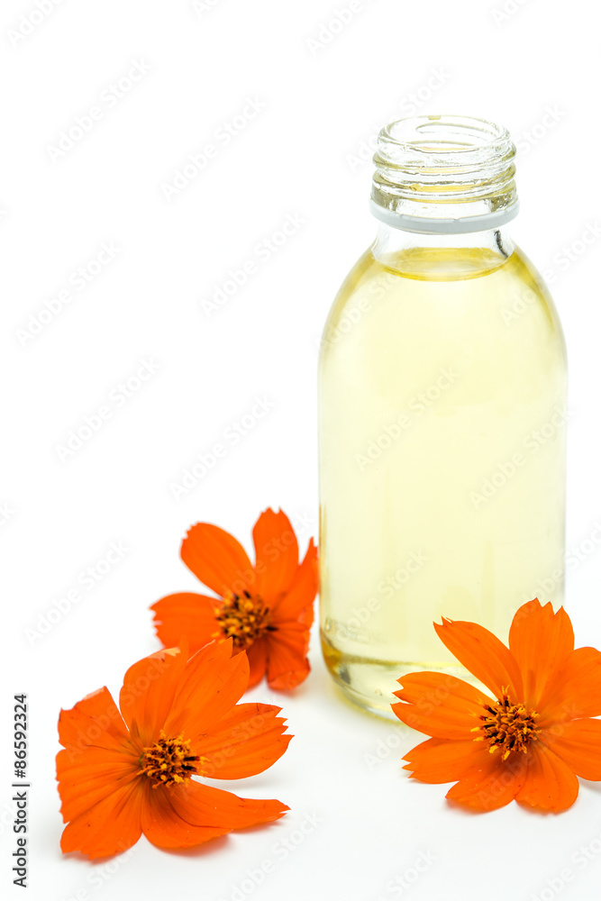 Spa and wellness setting with sea salt, oil essence, flowers Spa and wellness setting with sea salt, oil essence, flowers