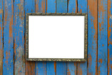 Old wooden picture frame on wooden background
