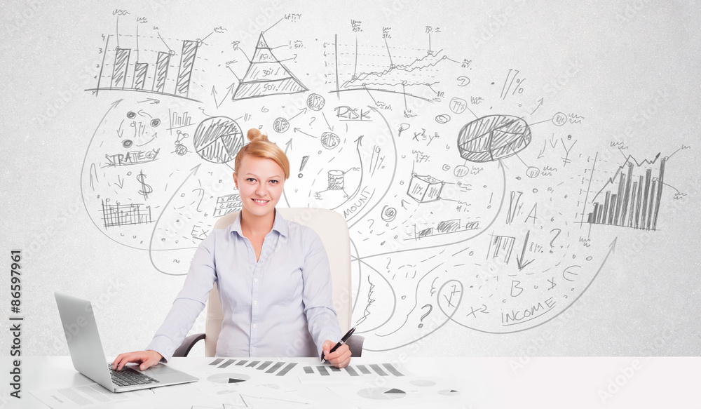 Business woman at desk with hand drawn charts Business woman at desk with hand drawn charts
