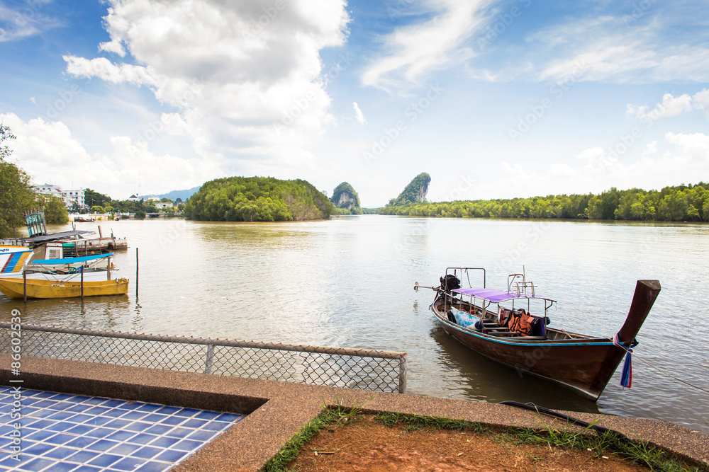 Fototapeta premium landscape cloud, blue sky, mountain and sea harbour at krabi tha