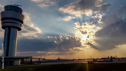 Airport traffic control tower at dramatic sunset in Sofia, Bulgaria