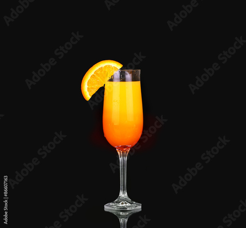 Mimosa cocktail glass  on black. design element
