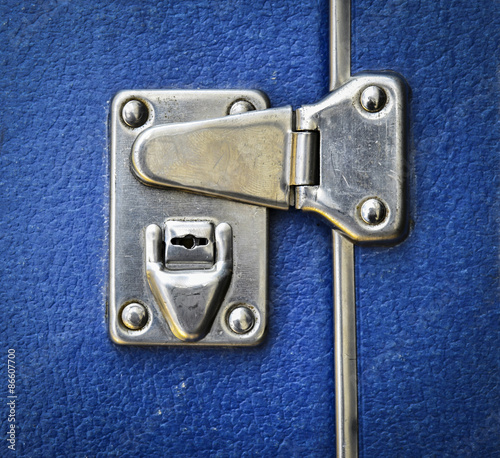 lock on a blue suitcase