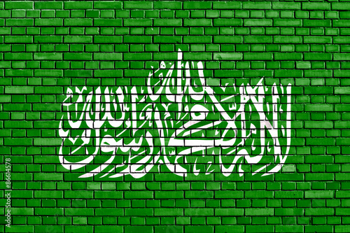 flag of Hamas painted on brick wall photo