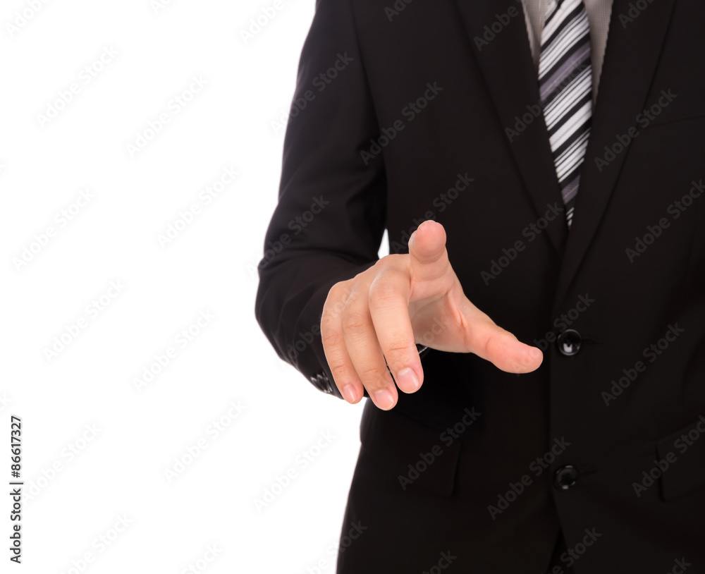 Business man touching an imaginary screen against white backgrou