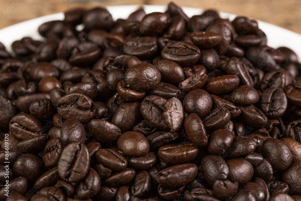Coffee bean on grunge wooden background Coffee bean on grunge wooden background