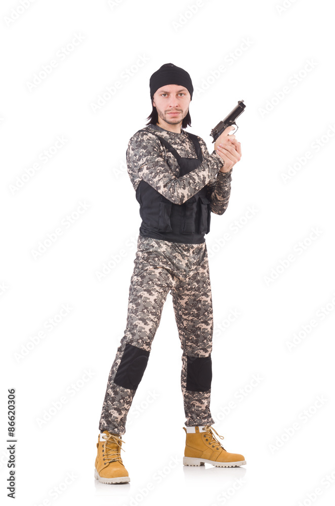 Young man in military uniform holding pistol isolated on white