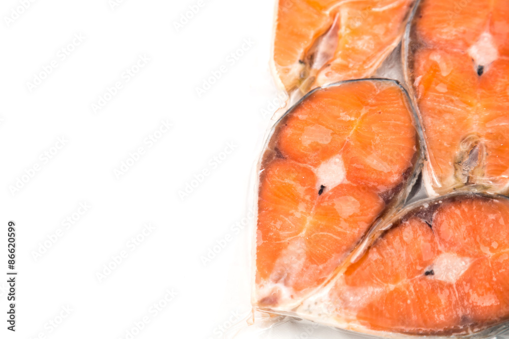 Frozen salmon fillets in a vacuum package Frozen salmon fillets in a vacuum package