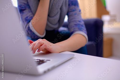 Business woman hands busy using laptop at office des